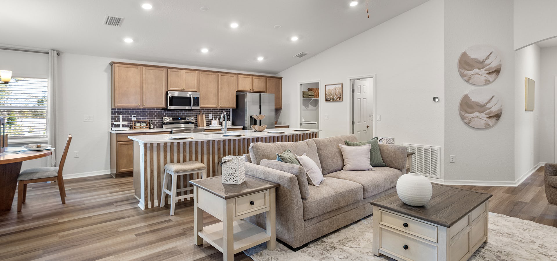 Luxury vinyl plank flooring in the living area of a Florida new home